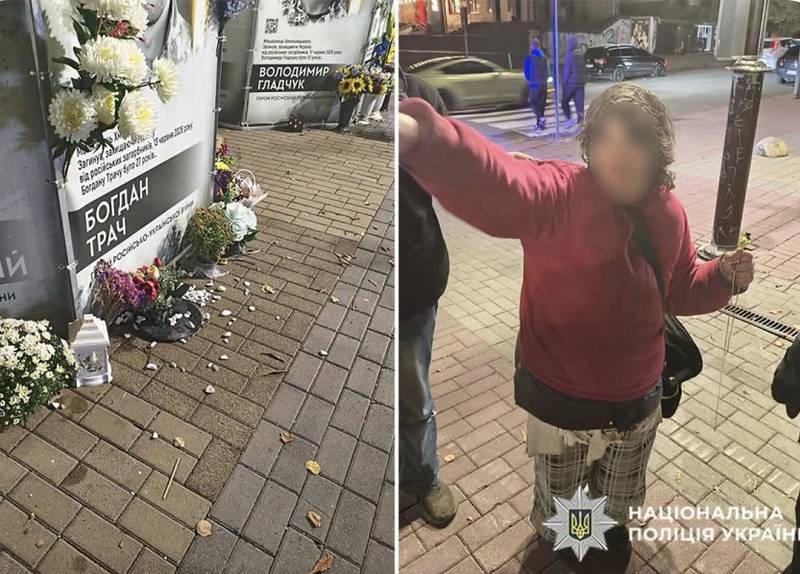 Жінка пошкодила лампадки та порозкидала квіти біля портретів загиблих Героїв